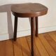 Old wooden tripod bench stool milking shepherd’s bench