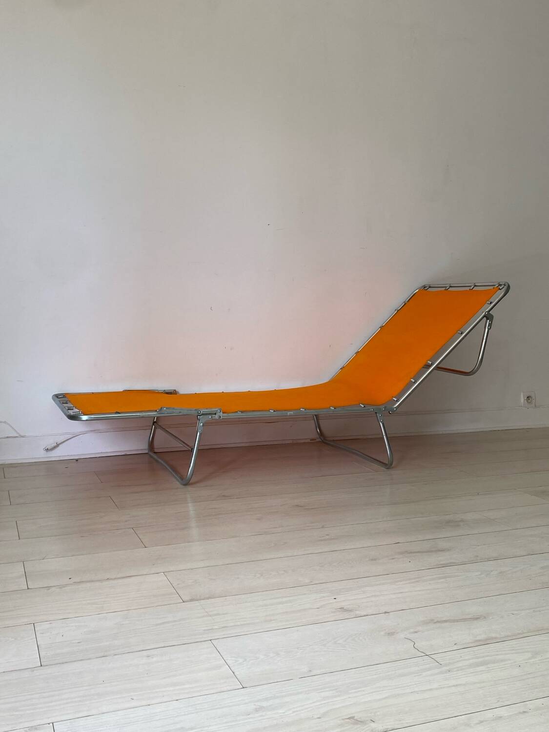 Orange and metal deckchair 1970