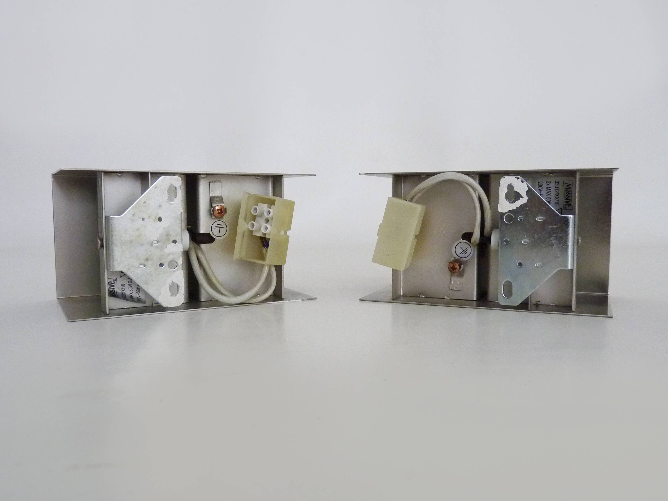 Pair of vintage chrome wall lights in Massive stainless steel