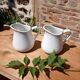 2 vintage milk jugs