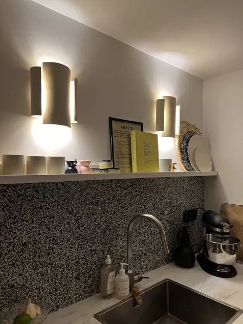 Set of two white TILE wall lights.