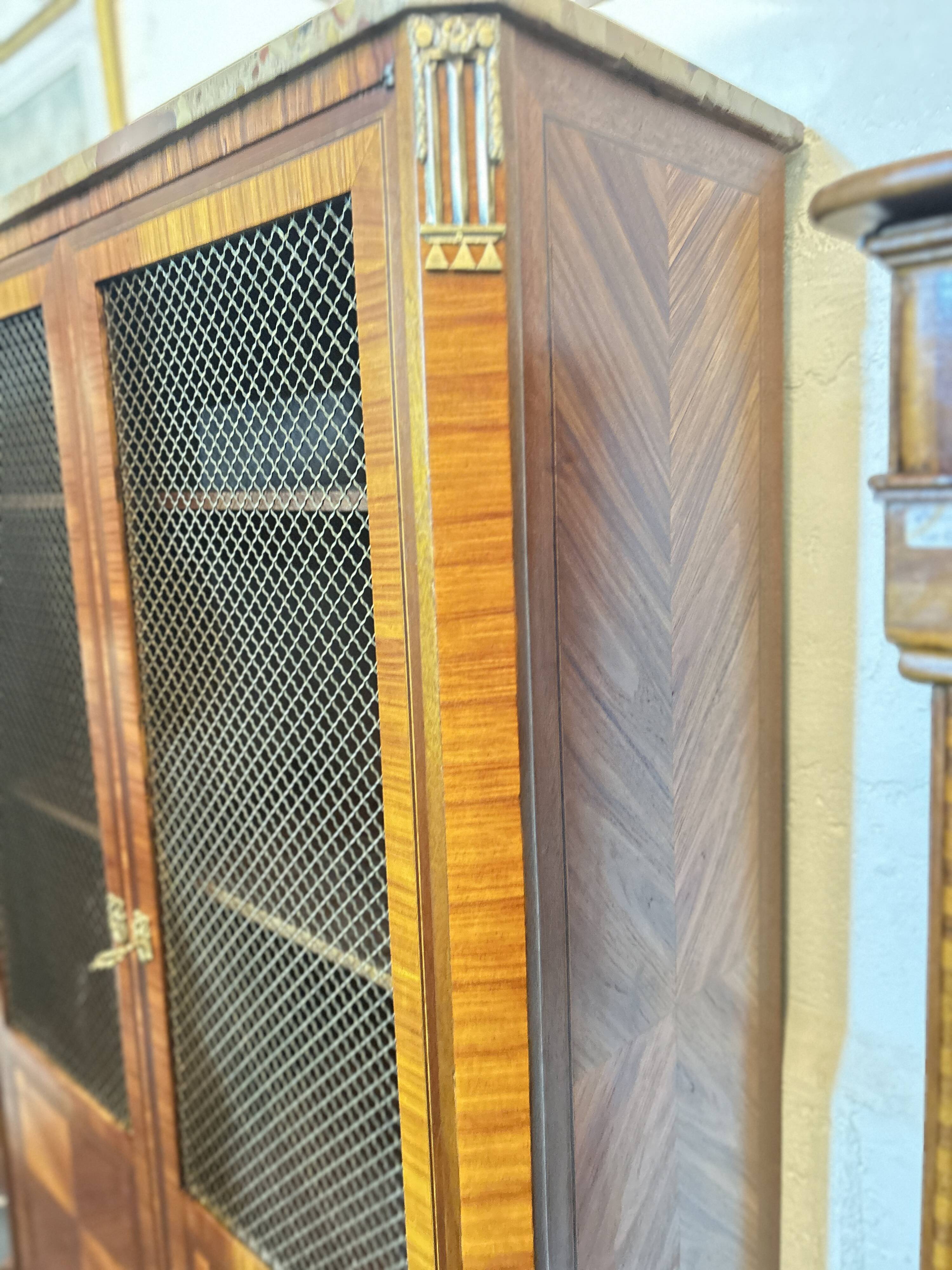Directoire style display cabinet with two doors