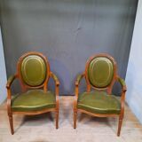 Pair of Louis XVI style leather armchairs