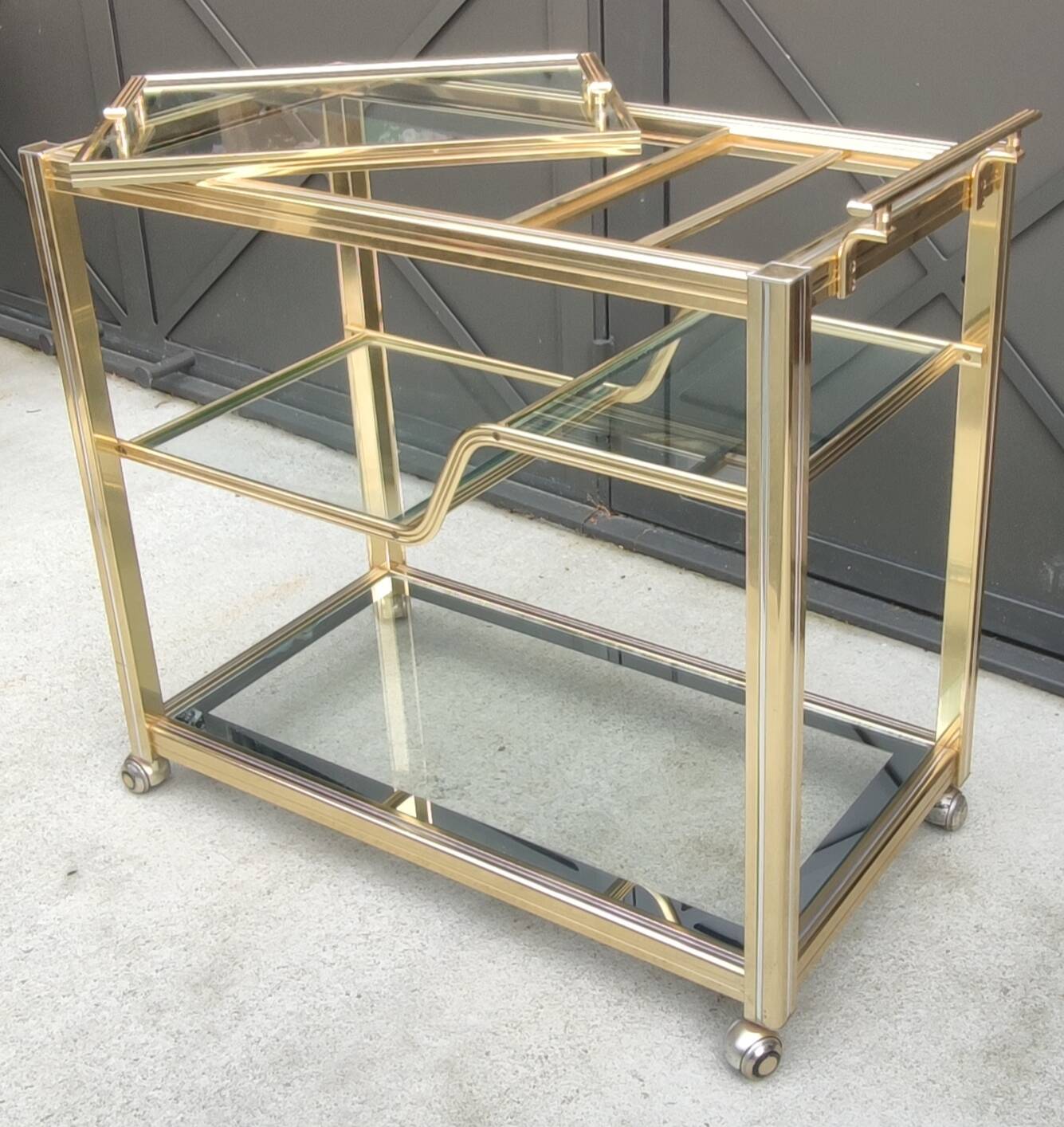 Rolling bar cart, gold-tone metal design, 1970s