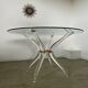 Venice model round dining table from Madelia by Paris Altuglas foot