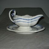 Saucière in Gien earthenware anse in the shape of a dolphin decoration garland 1900