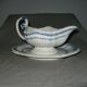 Saucière in Gien earthenware anse in the shape of a dolphin decoration garland 1900