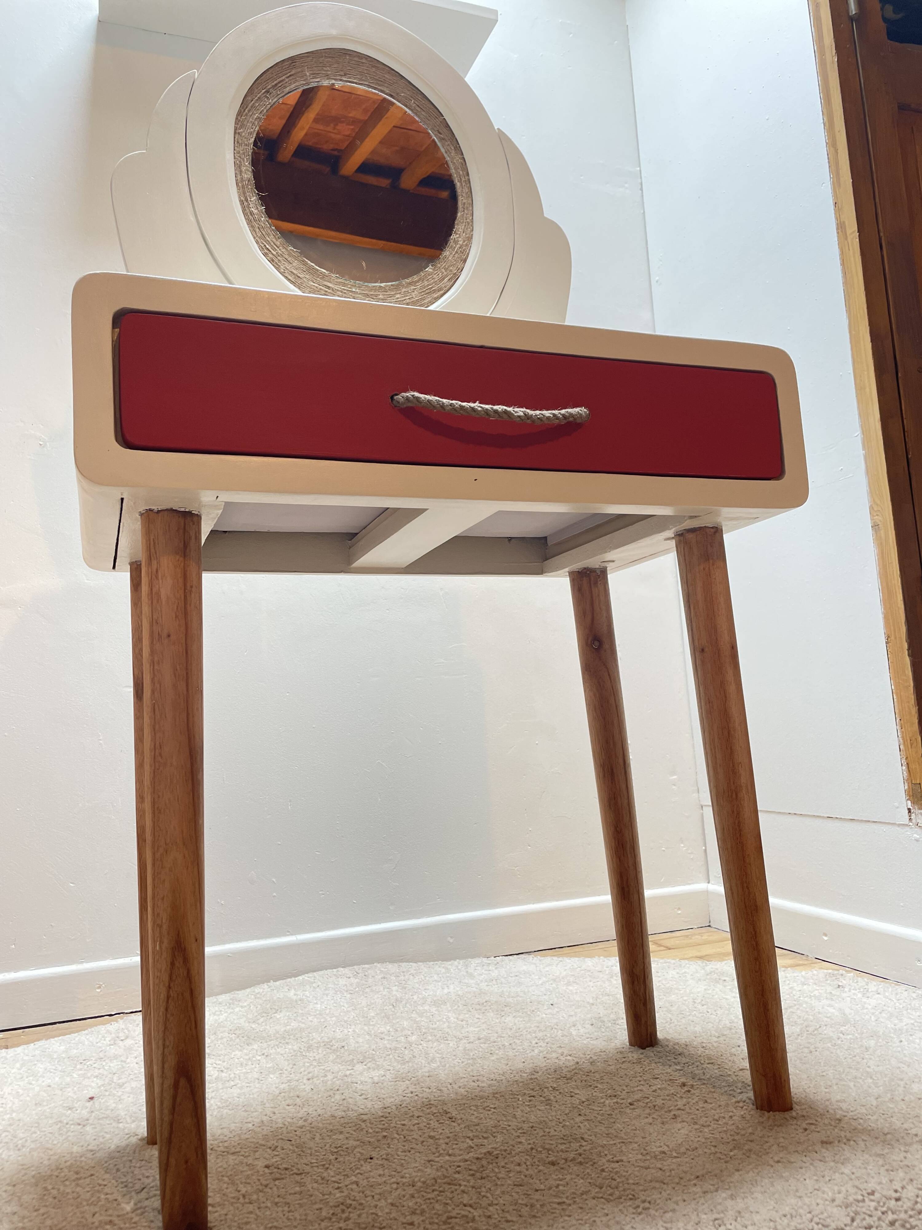 Wooden dressing table with beige and red baroque style mirror