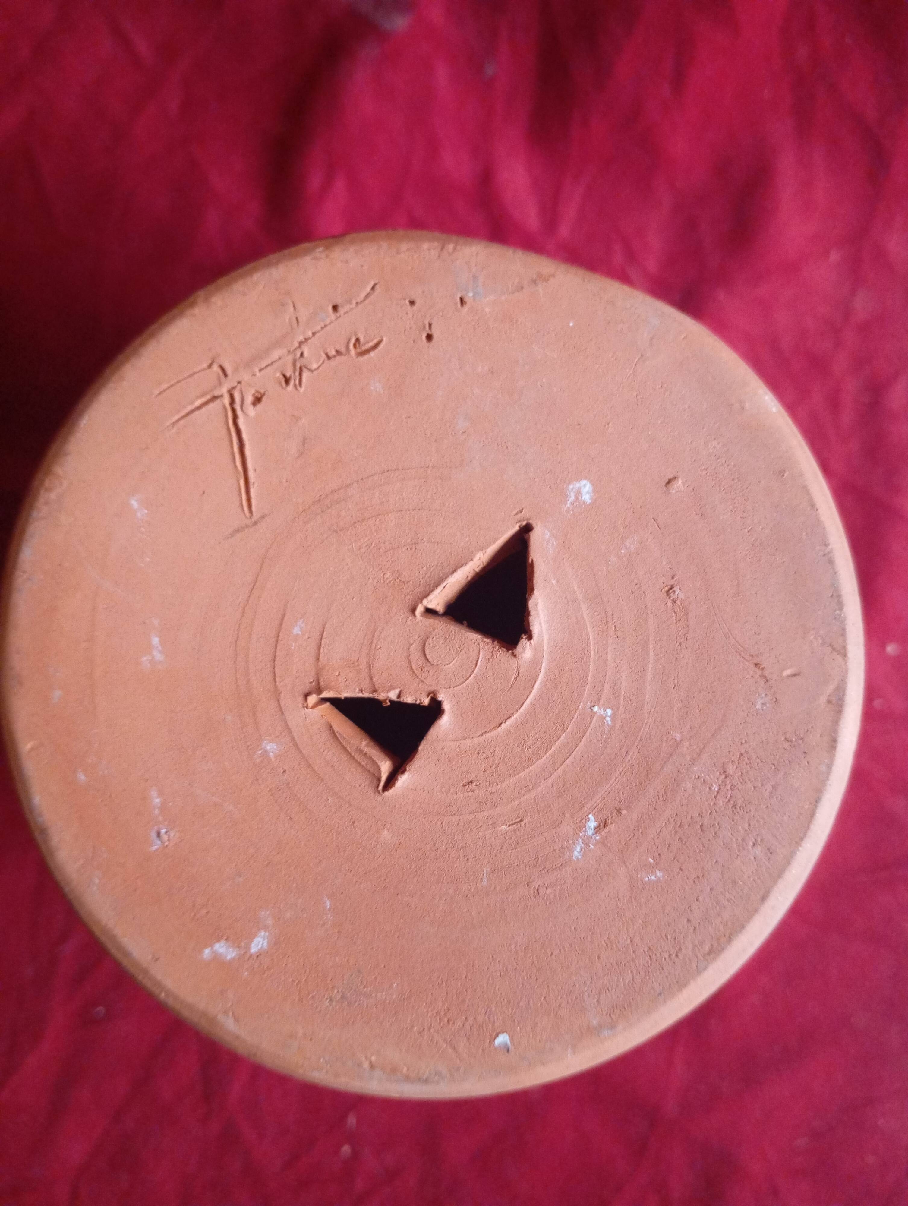 Artisanal terracotta lantern signed "fortune"