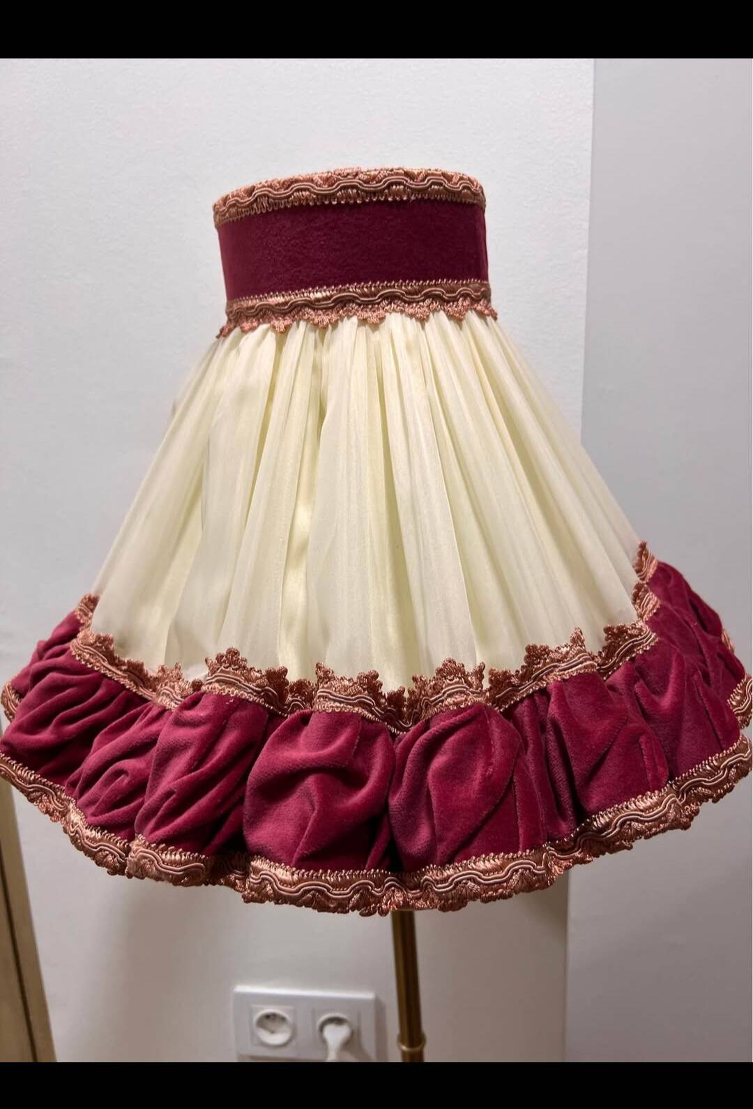 Unique floor lamp in Marie Antoinette style with a golden base.