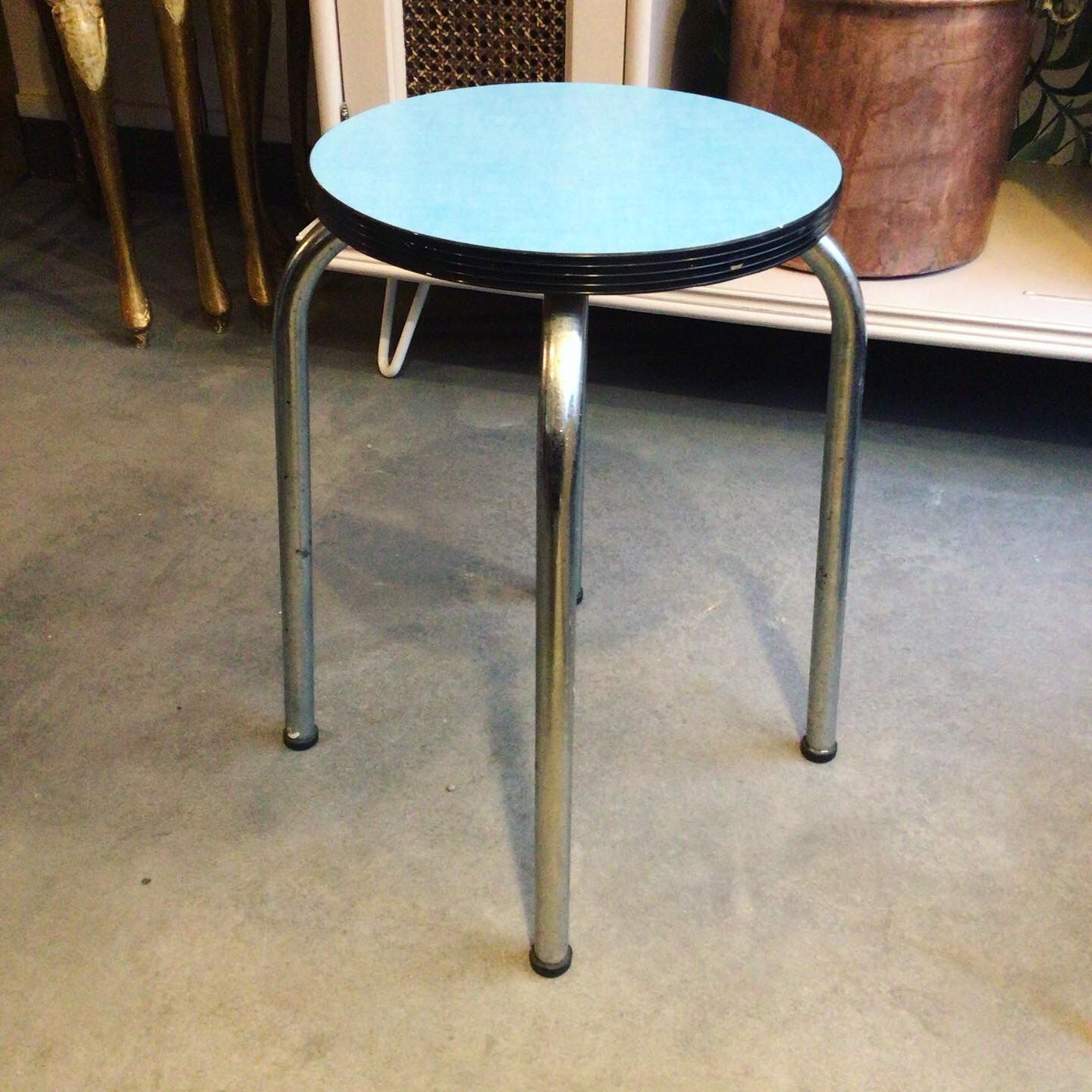 Round stool in blue formica
