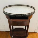 Pedestal table on marble