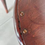 pair of round bistro chairs with a pattern on the seat, vintage