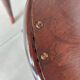 pair of round bistro chairs with a pattern on the seat, vintage