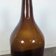 Large antique blown amber glass bottle