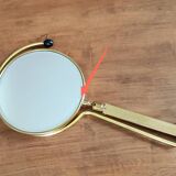 Vintage midi century brass barber mirror