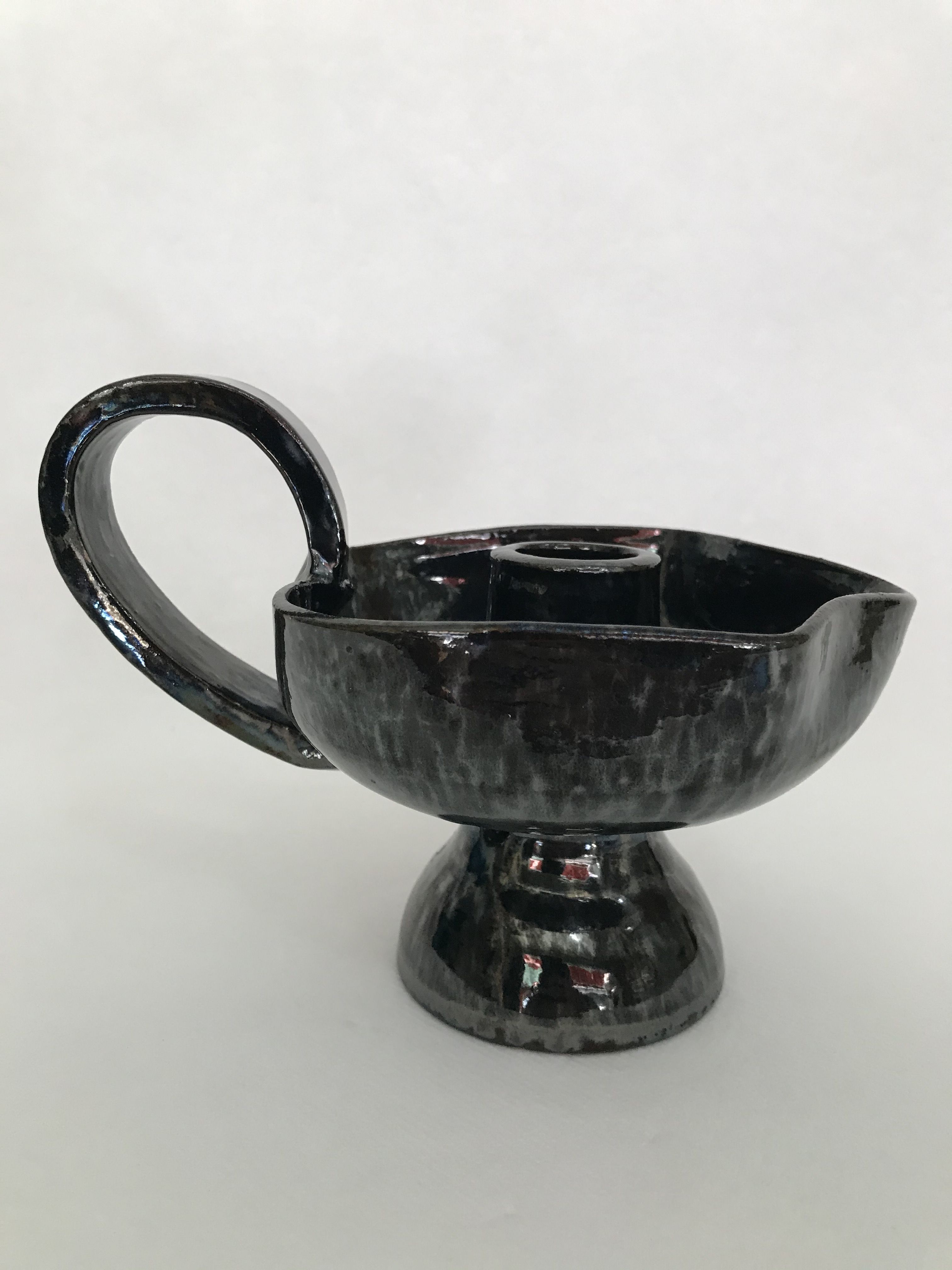 Black "hand- bougeoir with iridescents signed Fazio in Vallauris, circa 1950-1960