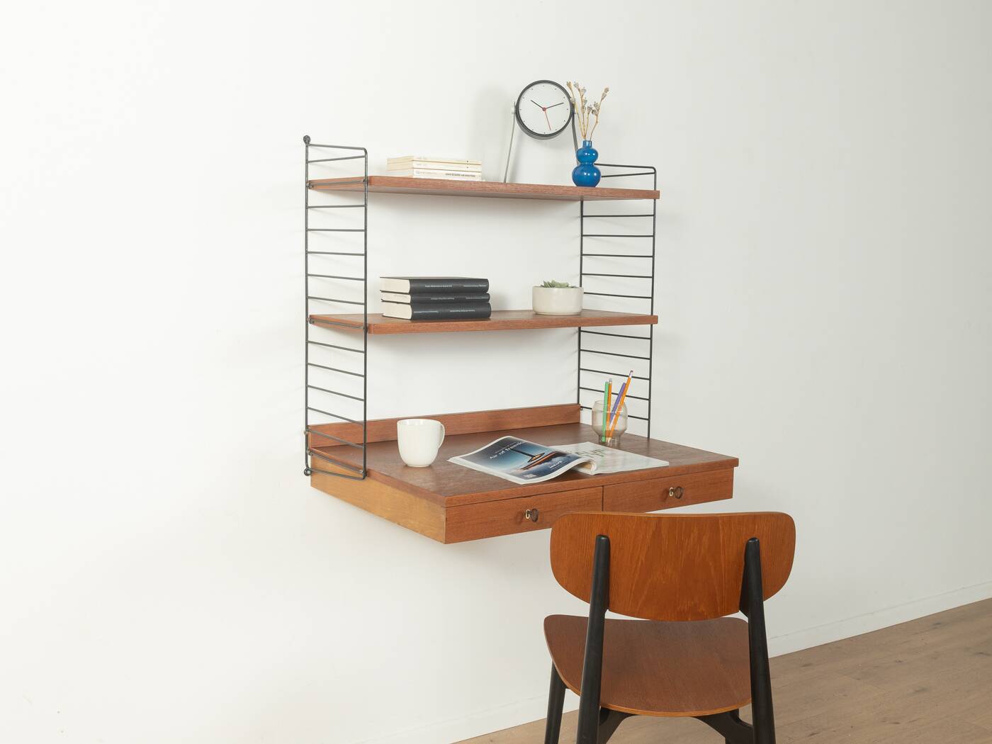 Original String shelf by Nils Strinning in teak veneer, 1949