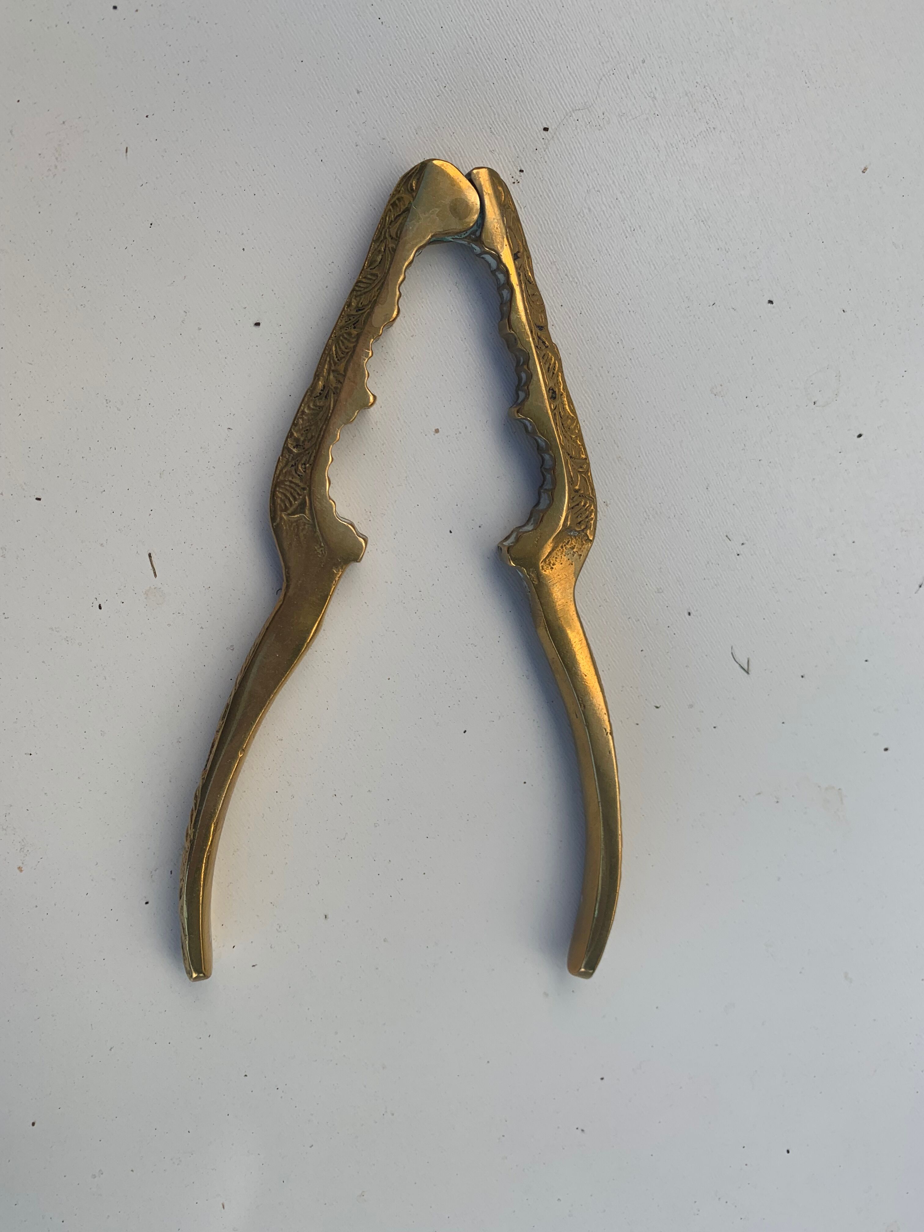 Nutcracker, vintage chiseled golden brass