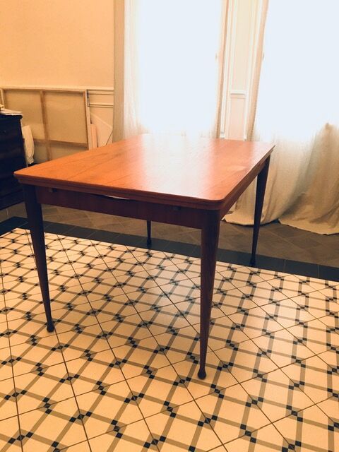 Danish dining table with built-in extension cords