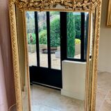 Large mirror style Louis XVI in gilded wood with parecloses xixth h: 165 cm