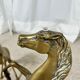 Hollywood Regency style coffee table, 6 patinated brass horses and glass top, 1970.