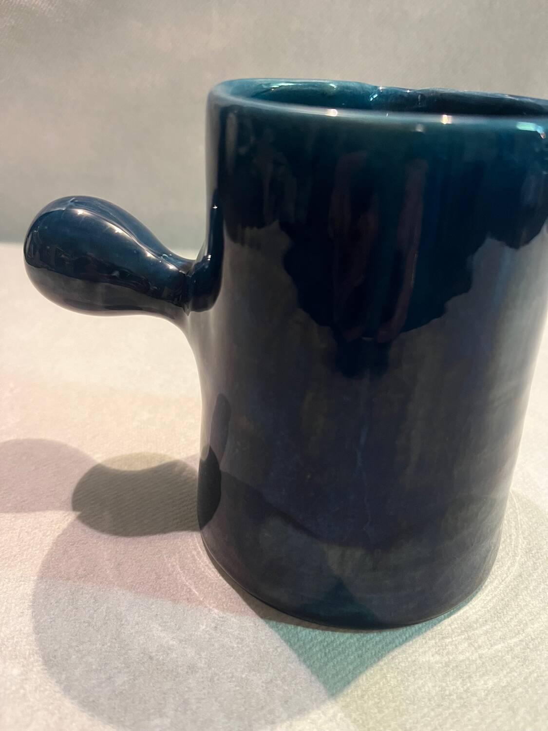 Blue ceramic milk jug