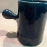 Blue ceramic milk jug