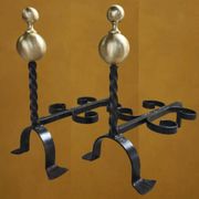 Pair of wrought iron candlesticks with cast bronze ball, 1970s.
