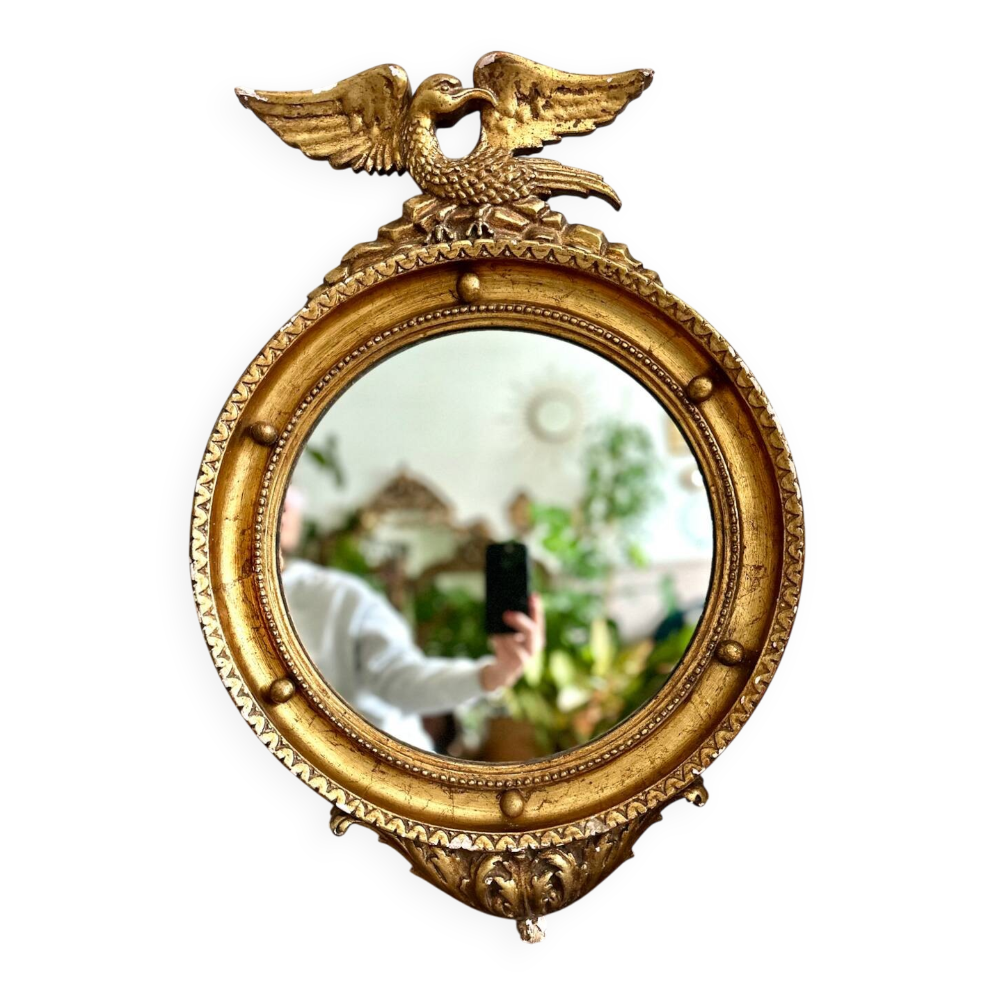 Antique gilded mirror decorated with an eagle