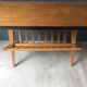 Coffee table, magazine rack with compass feet