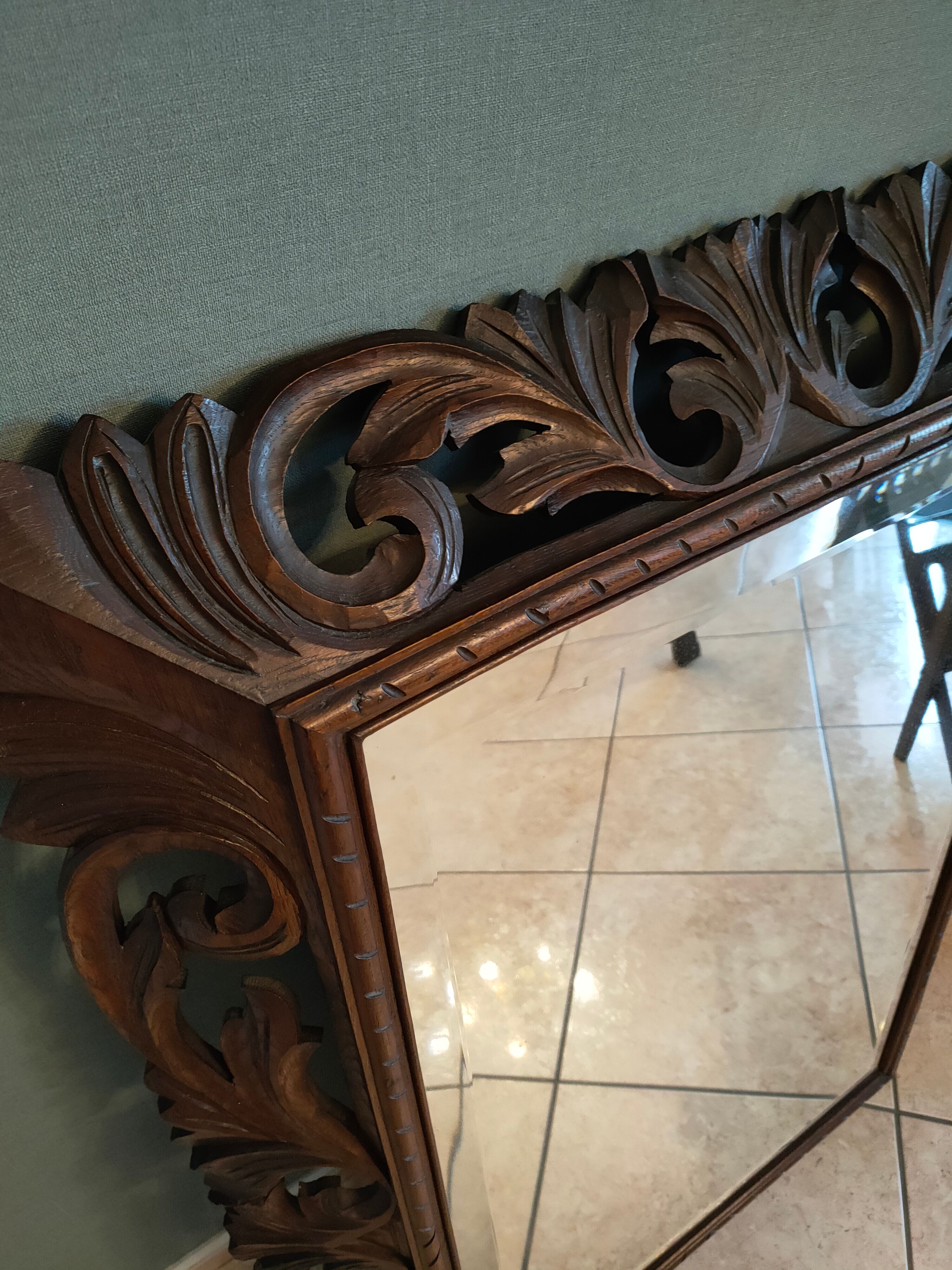 Antique mirror in openwork carved wood
