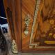 Support furniture in precious wood marquetry, richly decorated with floral marquetry.