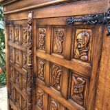 Spanish furniture with carved wood profiles and coats of arms from the 1950s.