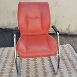 Orange leather cantilever tubular armchair