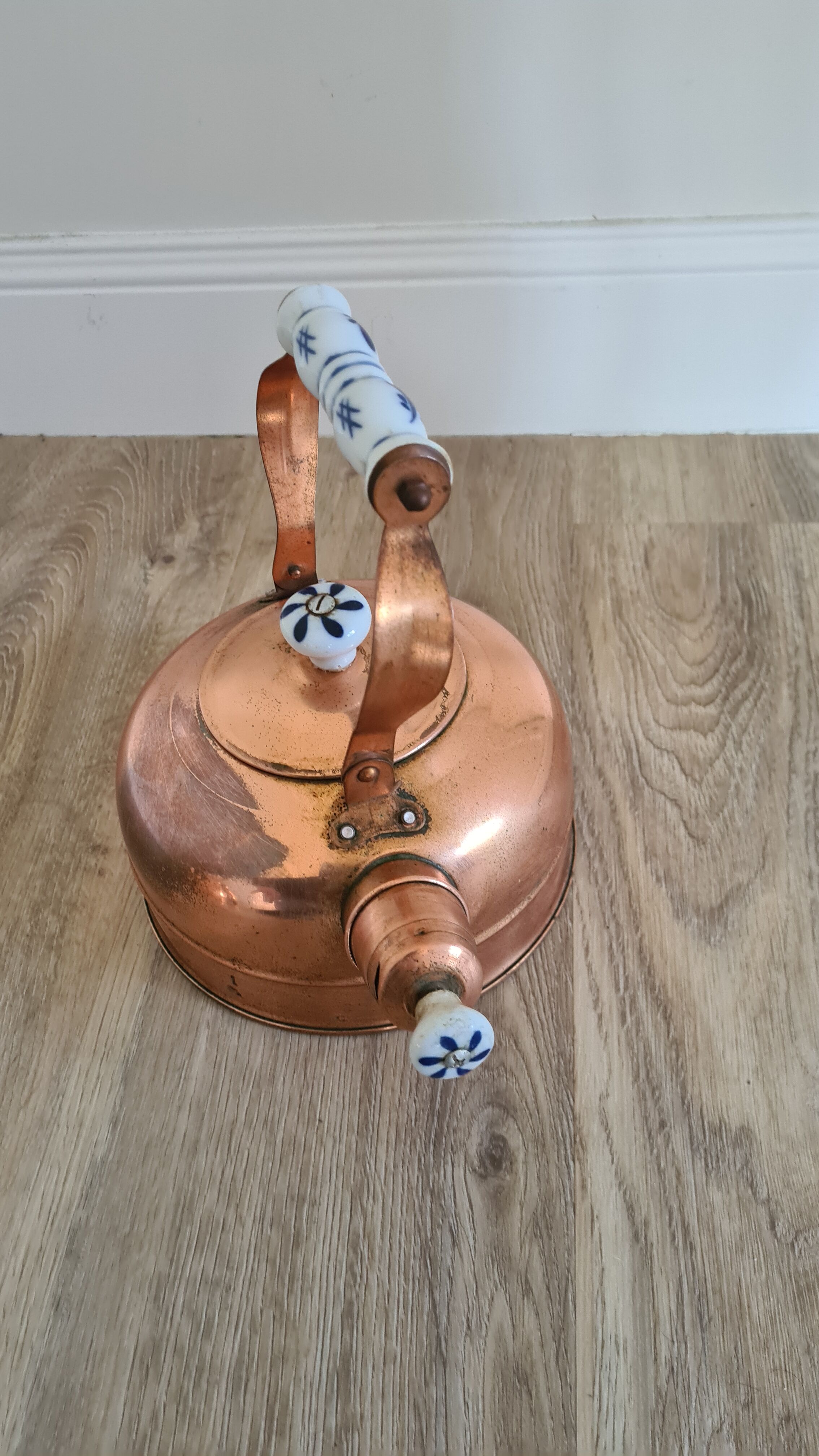 Old copper and porcelain teapot