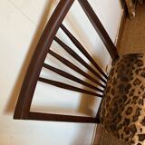 Pair of vintage wood and leopard chairs