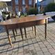 12-foot round oak table with 7 extensions / 20 people