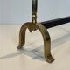 Pair of brass andirons with ducks. In the style of Maison Jansen.