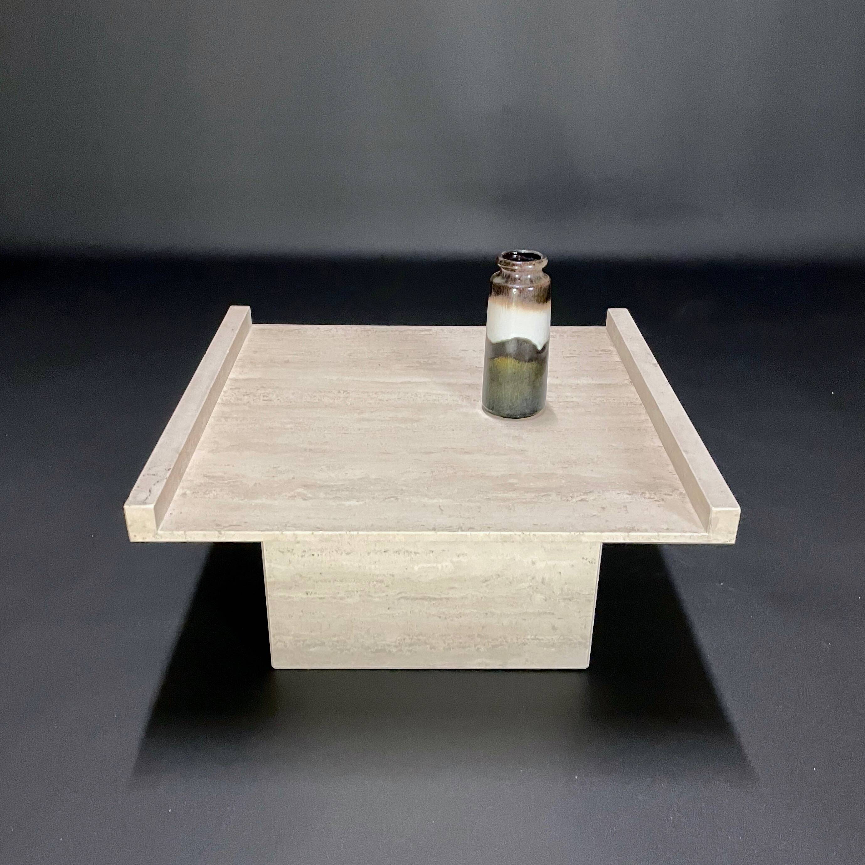 Square travertine coffee table by Claude Berraldacci. 1990s. France.