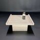 Square travertine coffee table by Claude Berraldacci. 1990s. France.