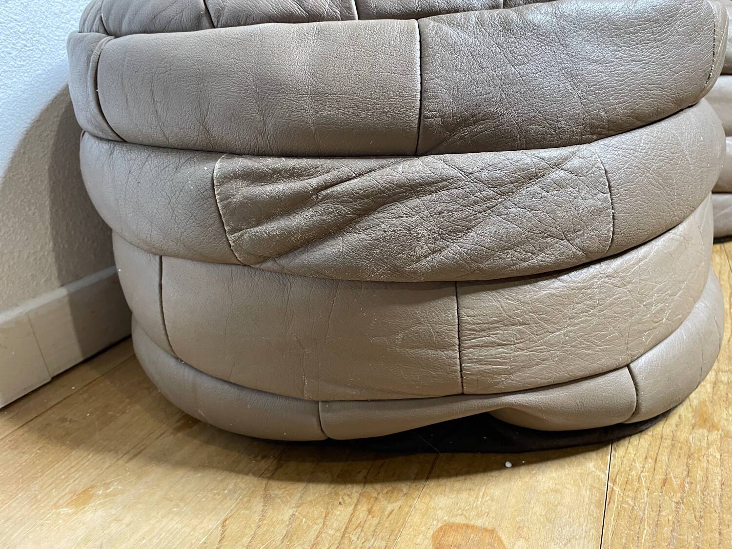 Pair of De Sède patchwork leather poufs
