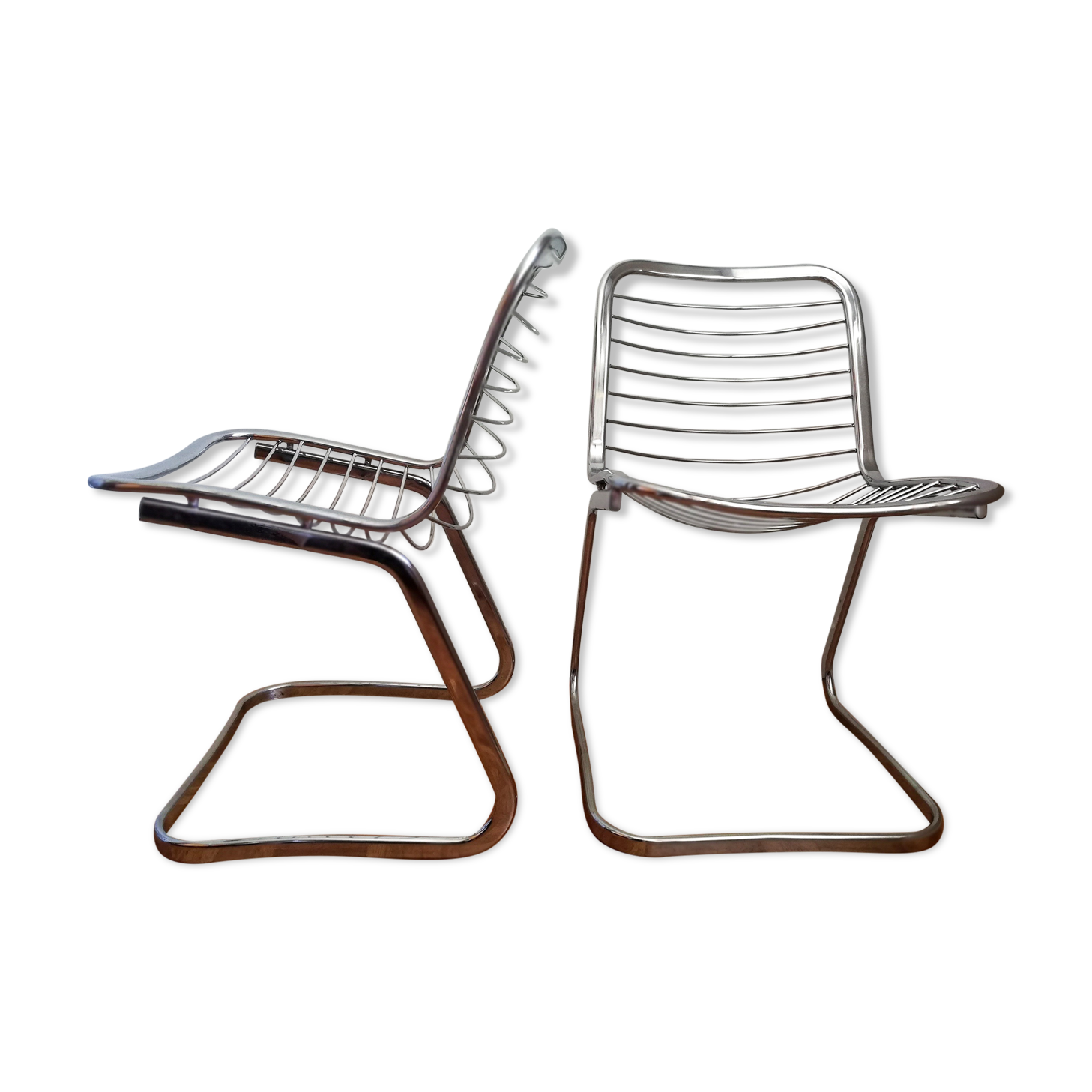 2 chrome wired chairs