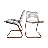 2 chrome wired chairs