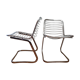 2 chrome wired chairs