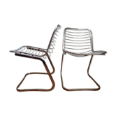 2 chrome wired chairs
