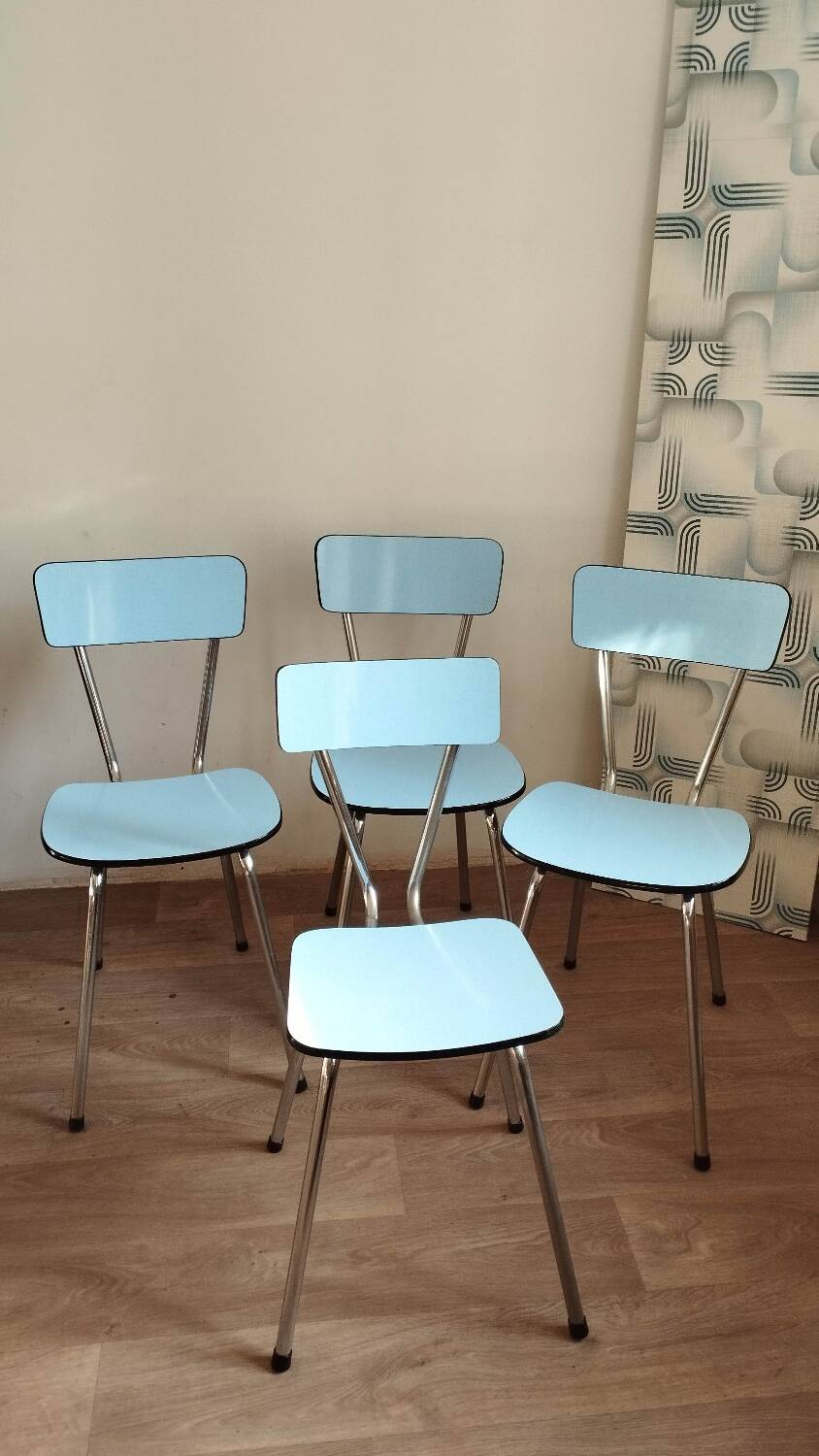 4 blue Formica chairs
