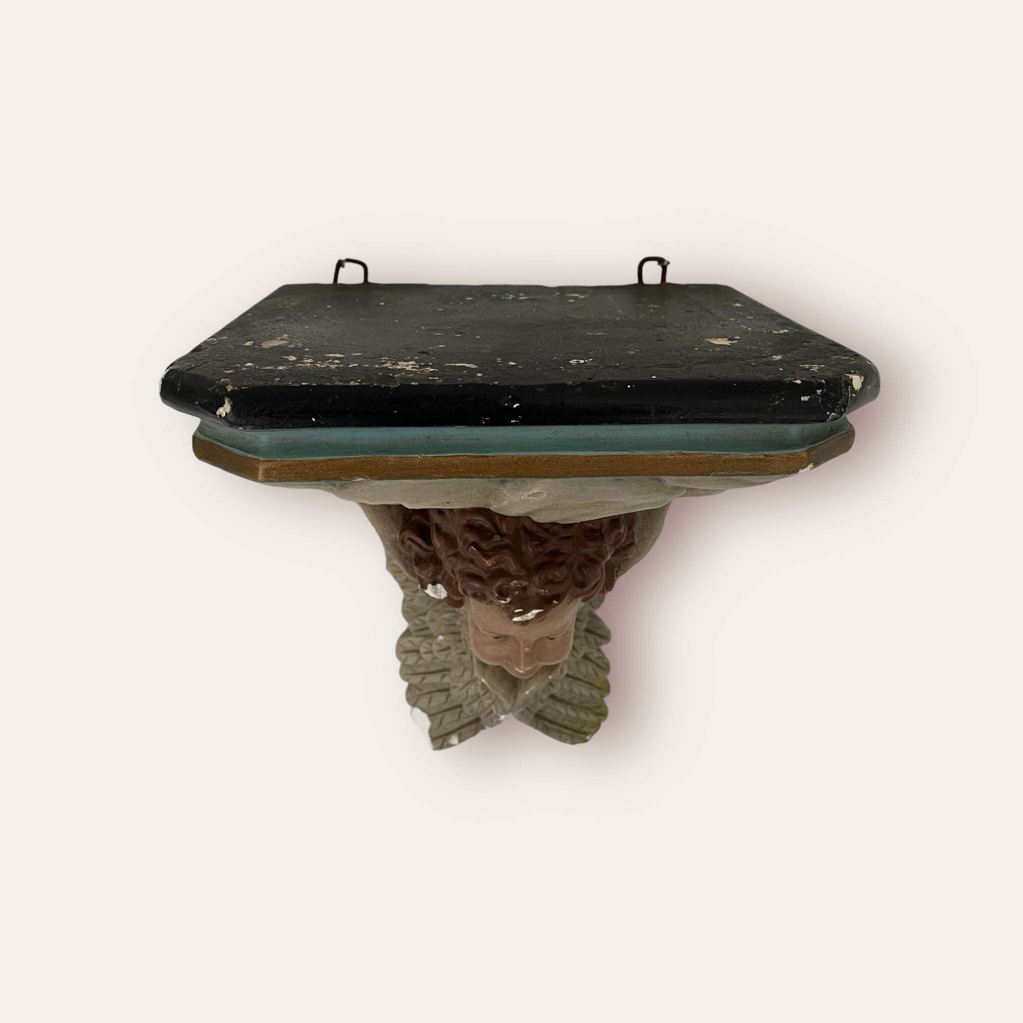 Nineteenth century plaster wall console, cherub decoration