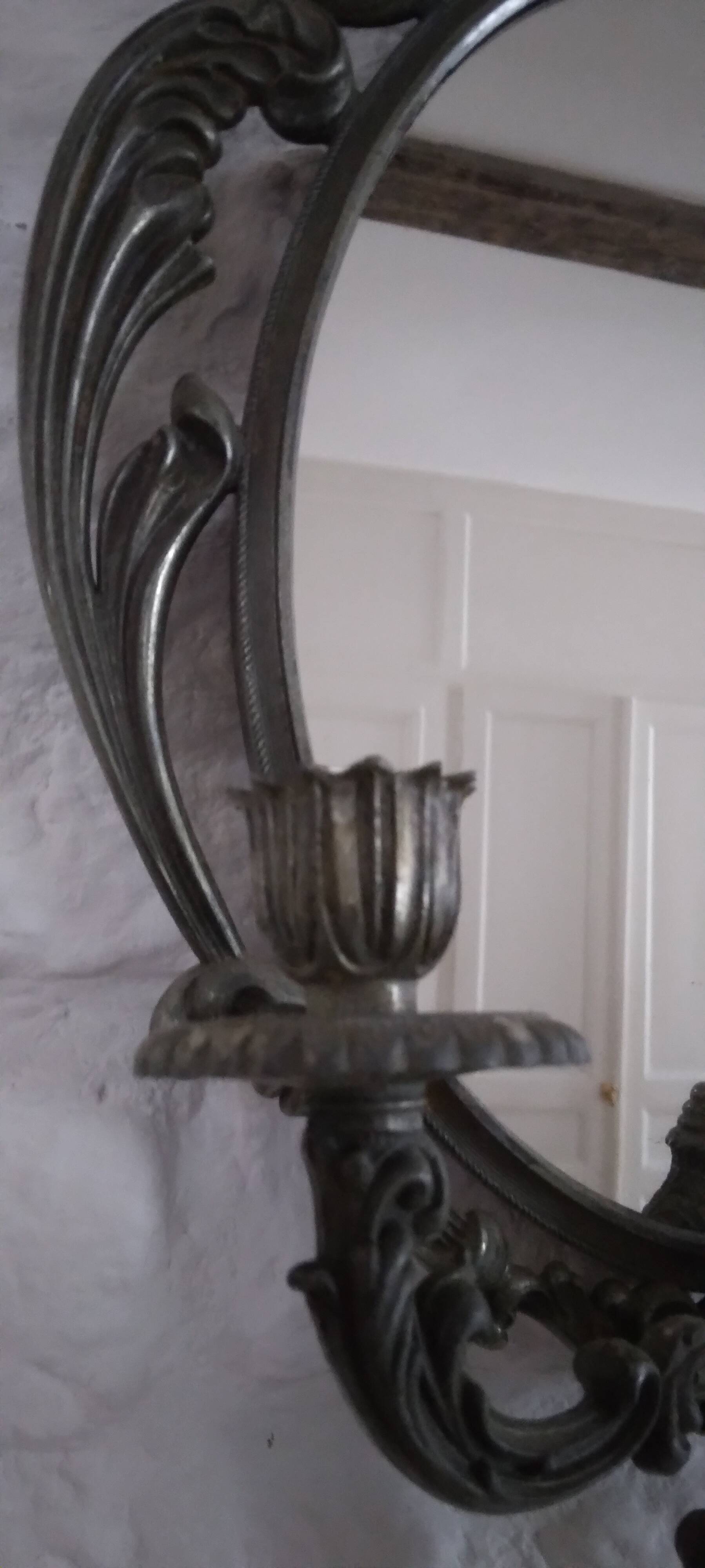 Candlestick mirror.