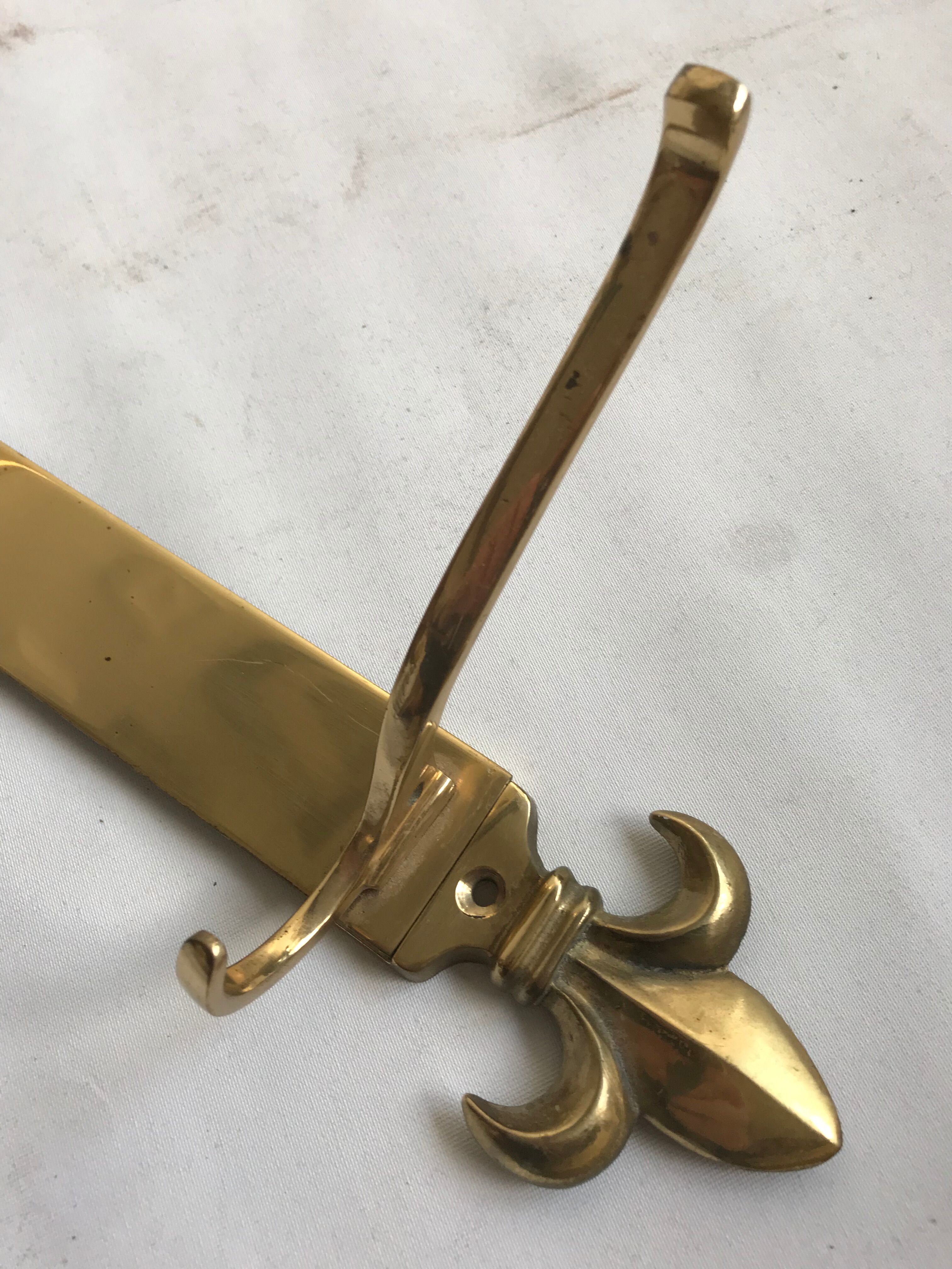 Golden brass wall rack